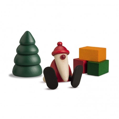 Björn Köhler - Miniaturset 1, Weihnachtsmann auf Kante sitzend mit Baum und Geschenken