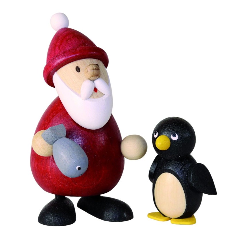 Weihnachtsmann mit Fisch und Pinguin